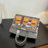 Birkin_Faubourg_20_Craftsmanship-Grey Yellow Pink Orange Bag